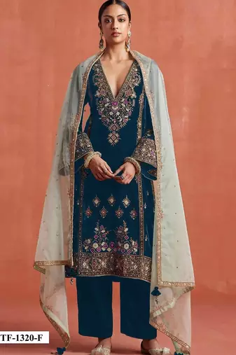 Teal heavy velvet semi stitched suit with embroidery work