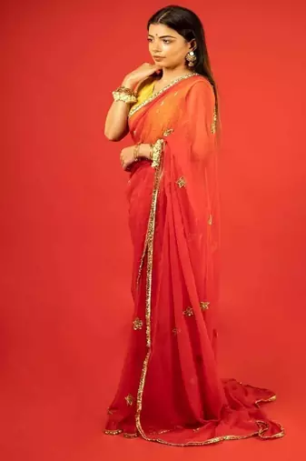 Red embroidered chiffon saree