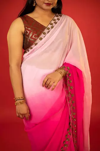 Pink embroidered georgette saree
