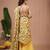 Yellow floral printed crepe pre draped saree