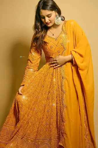 Faux blooming mustard yellow kali cut suit with sequins thread embroidery, stitched pants & dupatta set