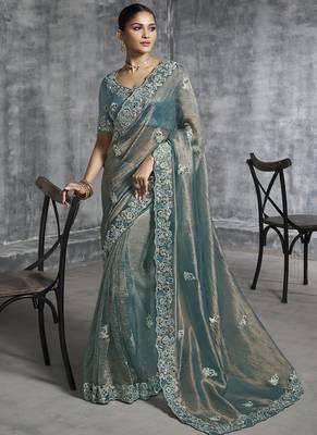 Turquoise silk embroidered wedding wear saree 1