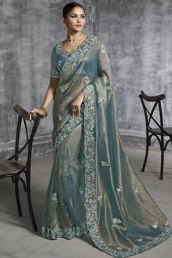 Turquoise silk embroidered wedding wear saree