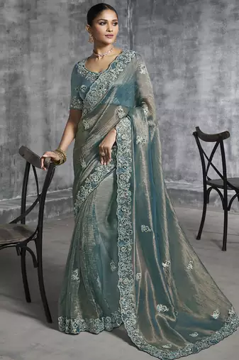 Turquoise silk embroidered wedding wear saree