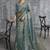 Turquoise silk embroidered wedding wear saree