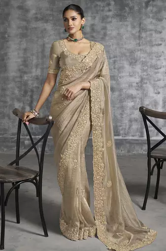 Beigesilk embroidered wedding wear saree
