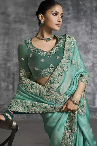 turquisesilk embroidered wedding wear saree