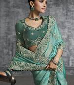 turquisesilk embroidered wedding wear saree