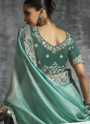 turquisesilk embroidered wedding wear saree 2