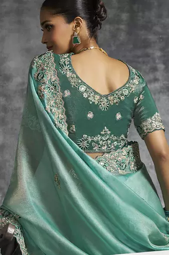 turquisesilk embroidered wedding wear saree