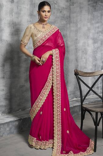 Red silk embroidered wedding wear saree