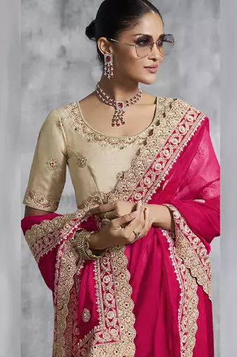 Red silk embroidered wedding wear saree