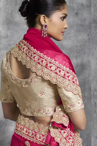 Red silk embroidered wedding wear saree