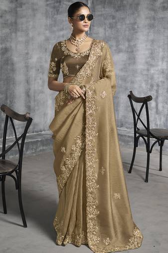 Beige silk embroidered wedding wear saree