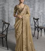 Beige silk embroidered wedding wear saree