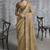Beige silk embroidered wedding wear saree