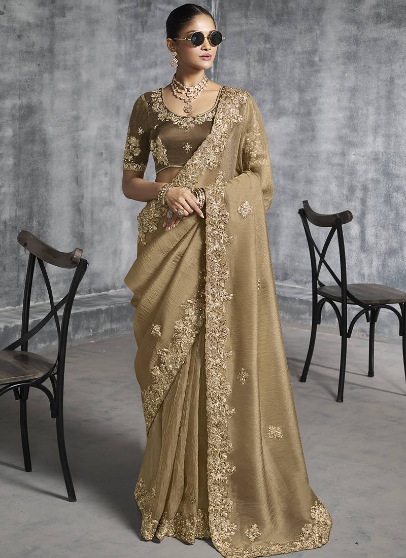 Beige silk embroidered wedding wear saree