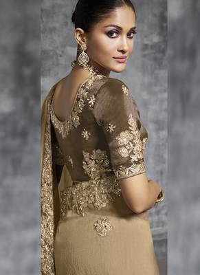 Beige silk embroidered wedding wear saree 2