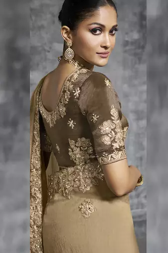 Beige silk embroidered wedding wear saree