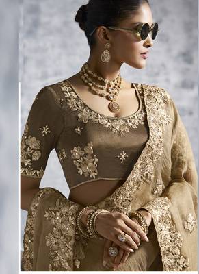 Beige silk embroidered wedding wear saree 3