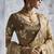 Beige silk embroidered wedding wear saree