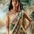 Ivory floral printed georgette saree