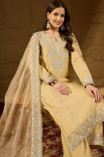 Women yellow silk blend solid embroidered straight kurta trousers with dupatta