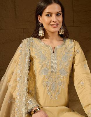 Women yellow silk blend solid embroidered straight kurta trousers with dupatta 2