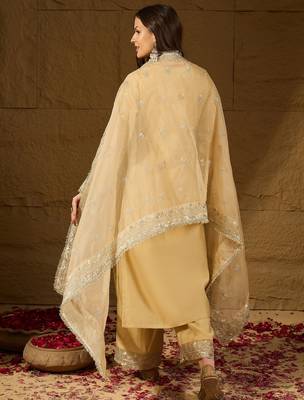 Women yellow silk blend solid embroidered straight kurta trousers with dupatta 4