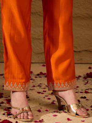Women orange silk blend solid embroidered a-line kurta trouser with dupatta 5