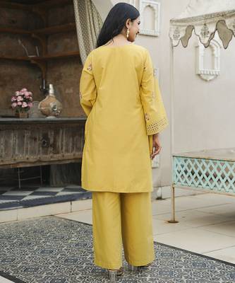 Women yellow pure cotton solid embroidered coord sets 4