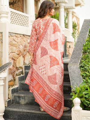 Women orange rayon blend floral printed straight kurta trousers with dupatta 4