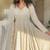 Faux blooming white kali cut suit with sequins thread embroidery, stitched pants & dupatta set