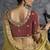 Mustard tissue traditional saree with embroidered, resham and thread work for ceremonial