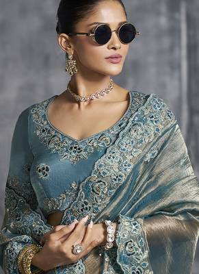 Teal blue tissue saree with embroidered work 2