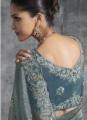 Teal blue tissue saree with embroidered work 3