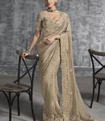 Beige tissue traditional saree with embroidered, resham and thread work for ceremonial