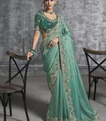 Turquoise tissue traditional saree with embroidered, resham and thread work for ceremonial