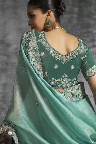 Turquoise tissue saree with embroidered work