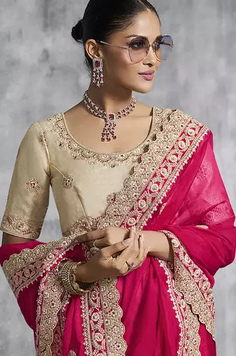 Hot pink embroidered and lace work satin saree