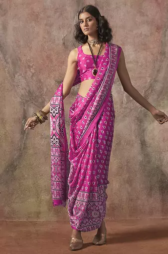 Pink color ajrakh print satin georgette saree