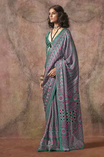 Turquoise color ajrakh print with bandhej pattern satin georgette saree