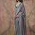 Turquoise color ajrakh print with bandhej pattern satin georgette saree
