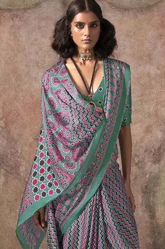 Turquoise color ajrakh print satin georgette saree