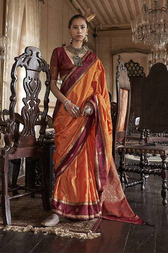 Orange exclusive tussar silk with elegant weaving work traditonal saree