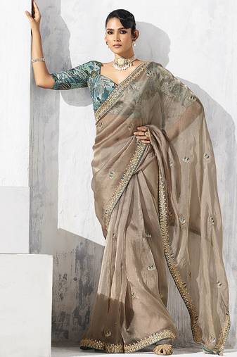 Beige fancy fabric embroidered contemporary saree