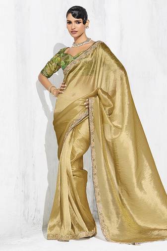 Golden fancy fabric embroidered contemporary saree