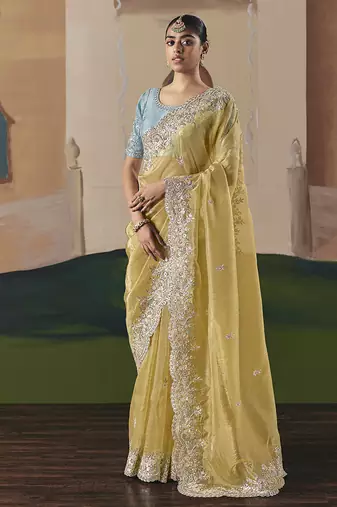 Embroidered pastel yellow fancy fabric party designer saree