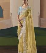 Embroidered pastel yellow fancy fabric party designer saree
