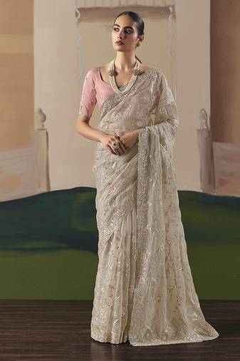 Embroidered cream fancy fabric party designer saree